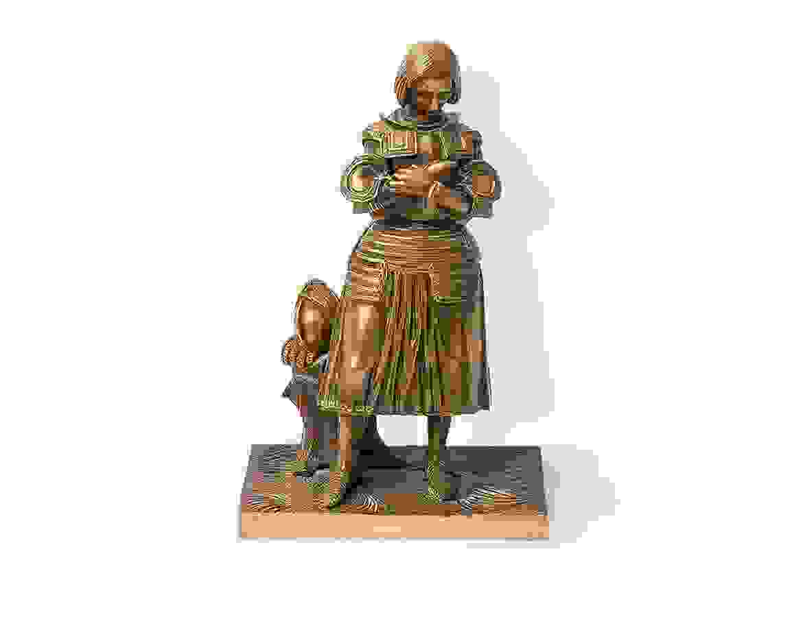 Metal statue of a lady